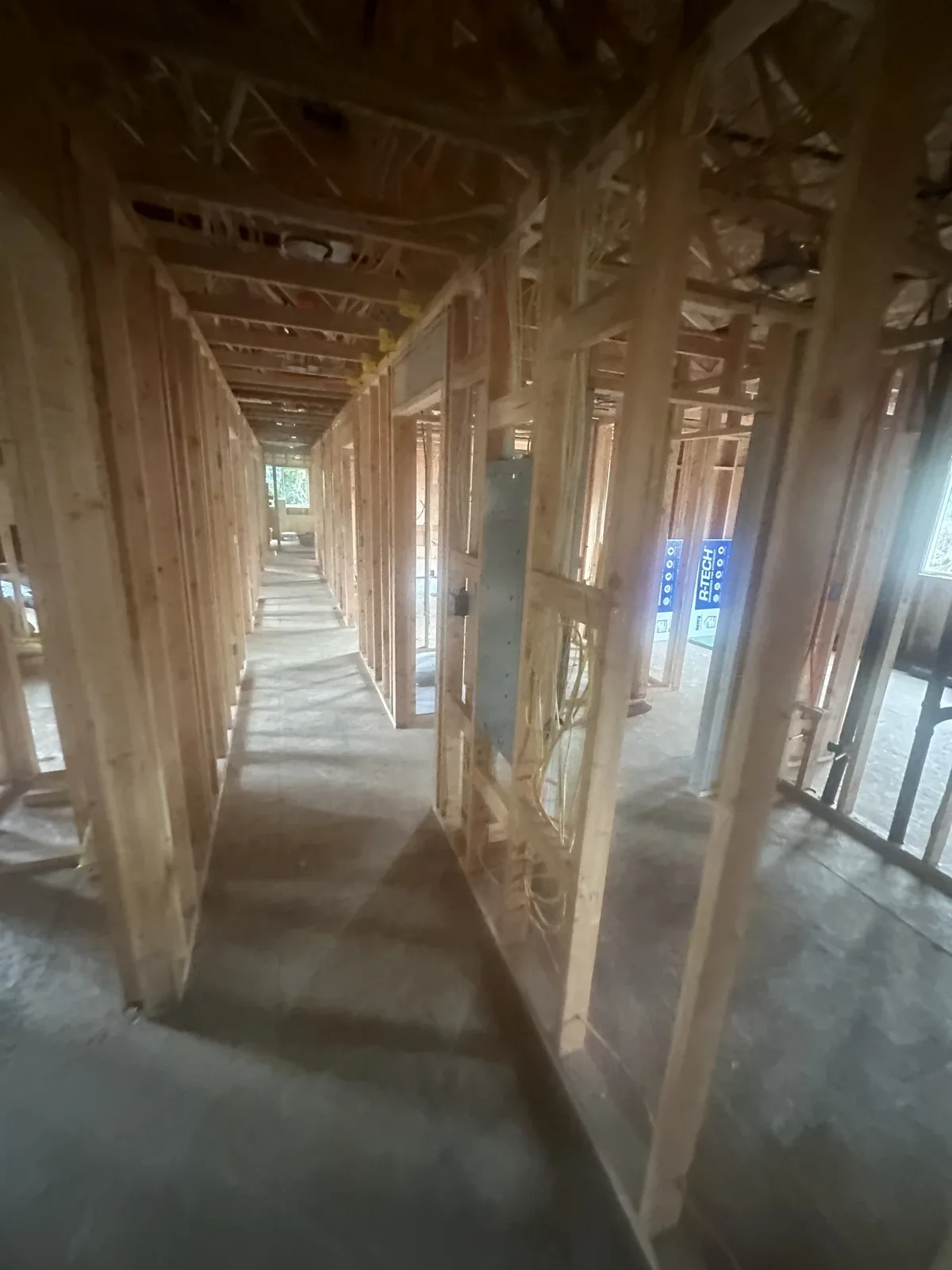 Hallway framing running the length of the house