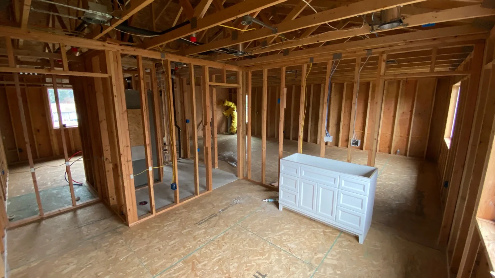 Kitchen island cabinet staged inside the framed main floor