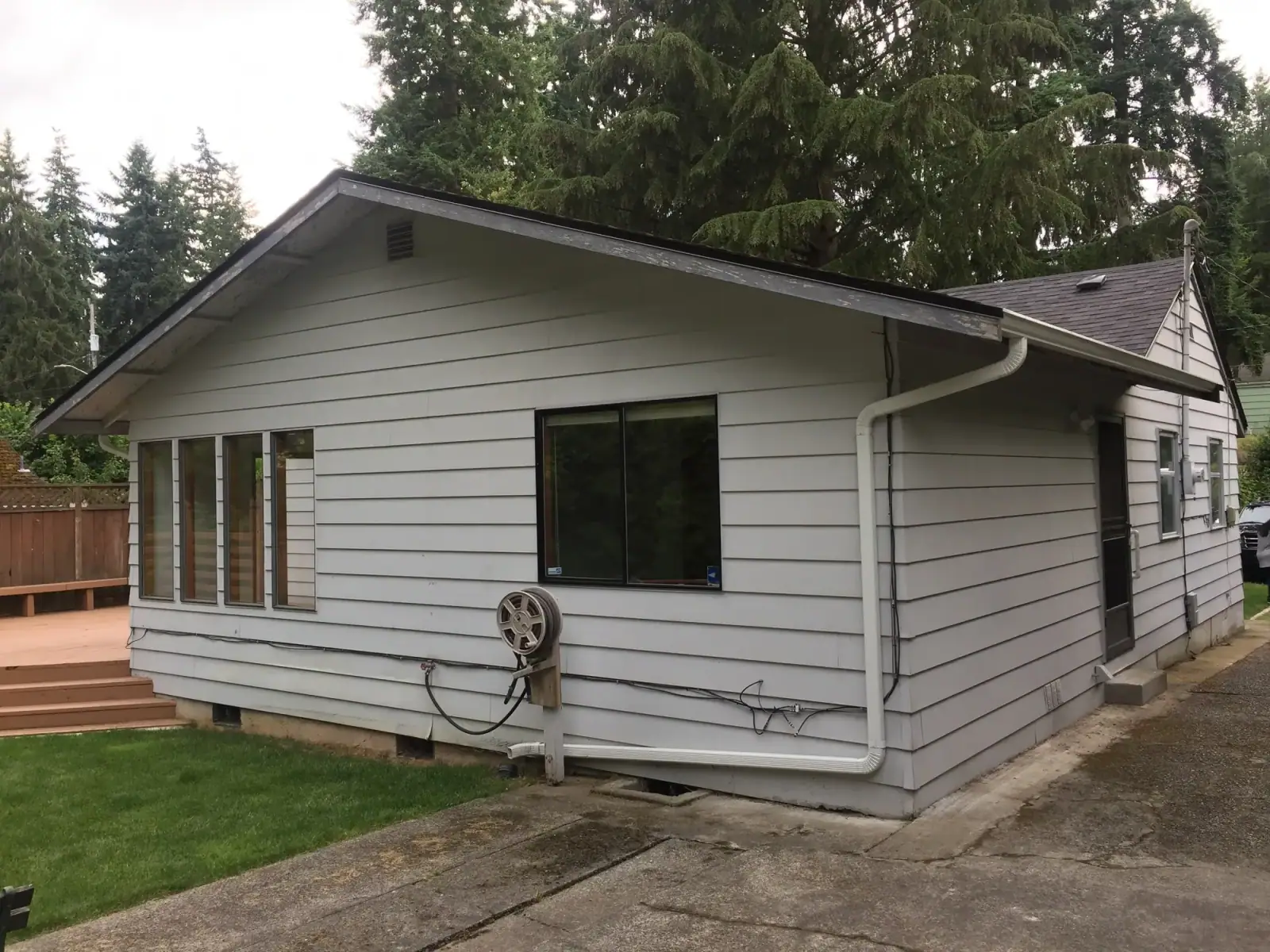 Rear of the original bungalow with its small deck before demolition
