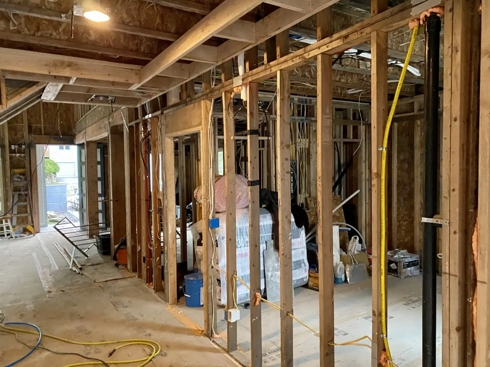 Electrical rough-in wiring run through the interior stud walls