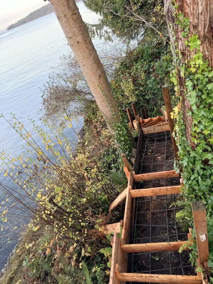 Stepped formwork with rebar for the beach stair on the Port Orchard bluff above Puget Sound